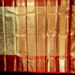 Kanchipuram Silk Gold Tissue Brocade Saree with Red Border
