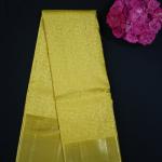 Kanchipattu silk gold yellow self brocade saree