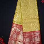 Kanchipattu silk yellow brocade saree with red border